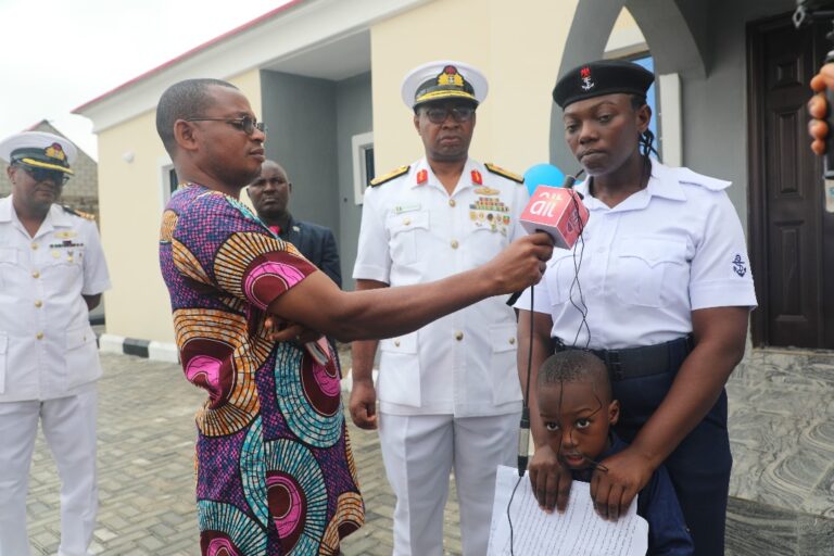 Snapshots: Navy Gifts Bungalow To Fallen Sailor’s Widow (7 Photos)