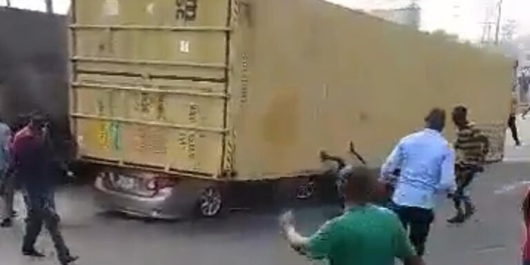Driver Miraculously Survives as 40-Foot Container Crushes Car in Lagos