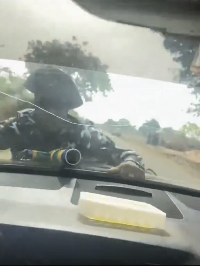 Shocking Video Shows Nigerian Policeman Carried on Car Bonnet at High Speed